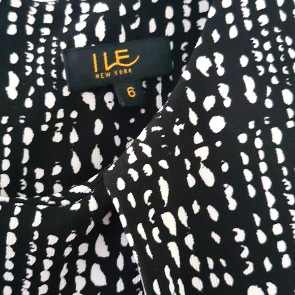 Size 6 black ⚫️ & white ⚪️ dress with multicolored trim midway down. - Picture 4 of 4